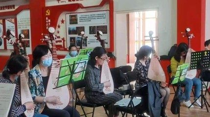 一揉玉弦萬般情，彈支紅曲給黨聽 文化藝術交流的深情頌歌